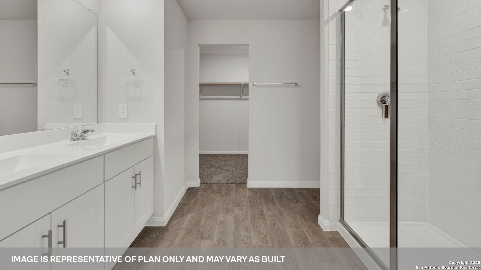 141 Raymondville Path San Marcos, TX 78666 - Photo 32 of 46 a bathroom with a sink and a mirror