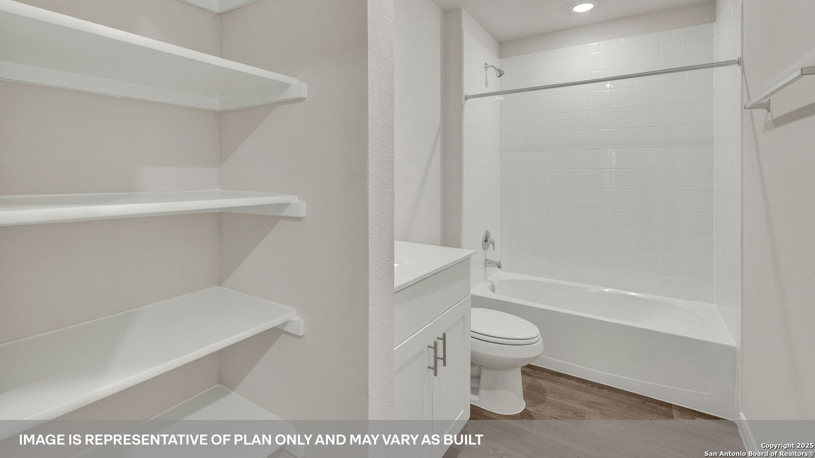 141 Raymondville Path San Marcos, TX 78666 - Photo 37 of 46 a bathroom with a toilet and a bathtub