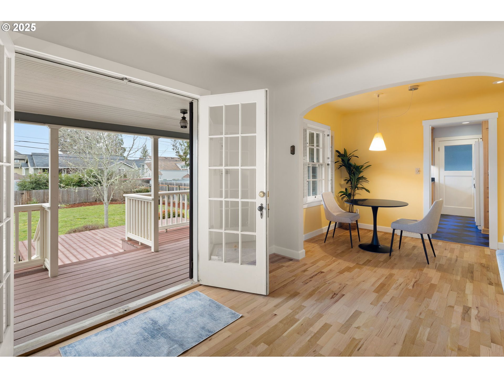 1944 Alder Street Eugene, OR 97405 - Photo 11 of 46 a view of an room with wooden floor and windows