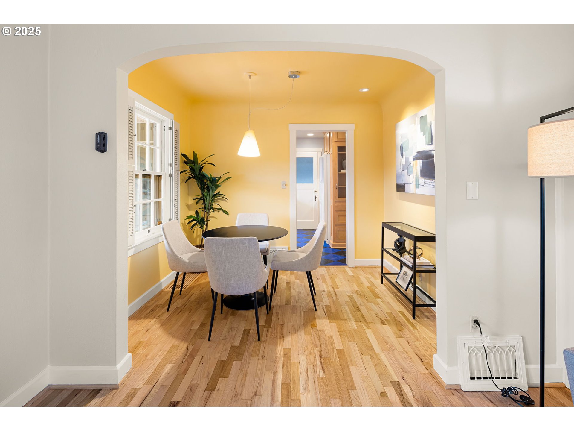 1944 Alder Street Eugene, OR 97405 - Photo 12 of 46 a view of a dining room with furniture and wooden floor