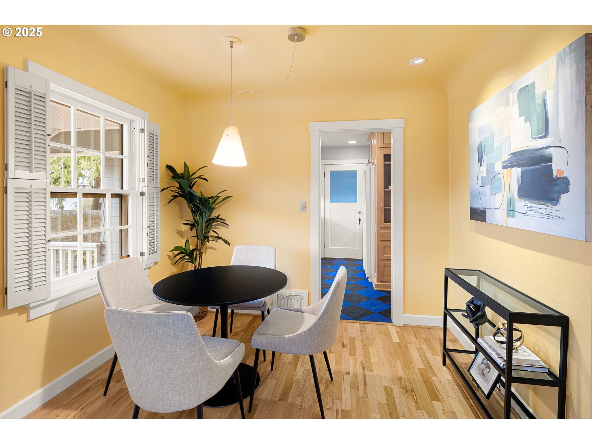 1944 Alder Street Eugene, OR 97405 - Photo 13 of 46 a view of a dining room with furniture and wooden floor