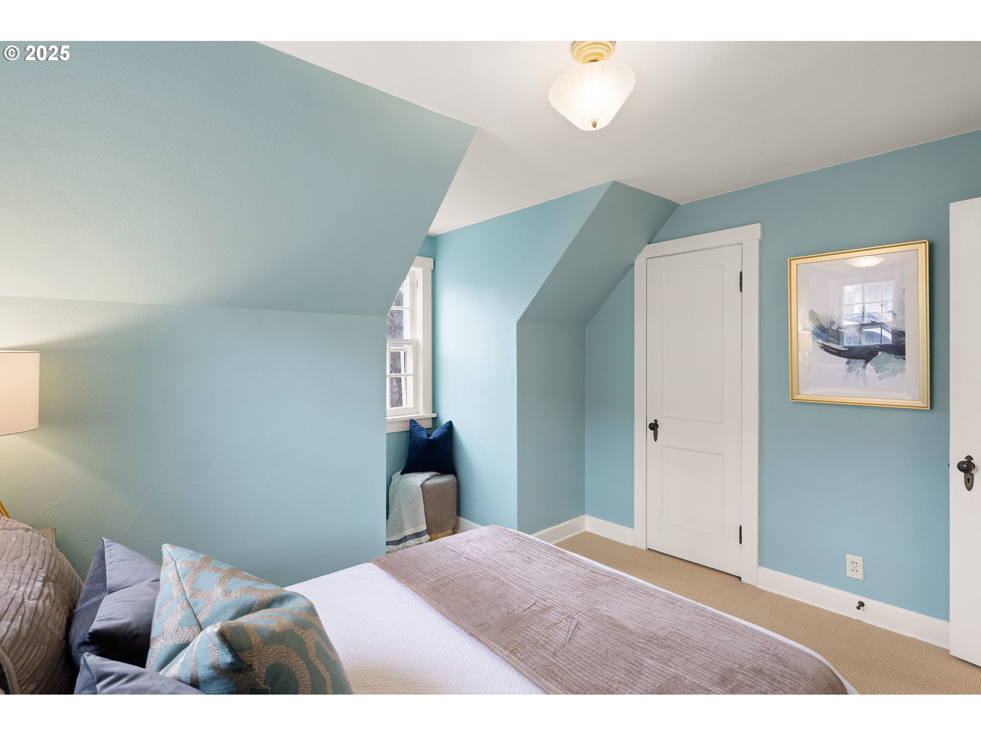 1944 Alder Street Eugene, OR 97405 - Photo 29 of 46 a bedroom with a bed and a painting on the wall