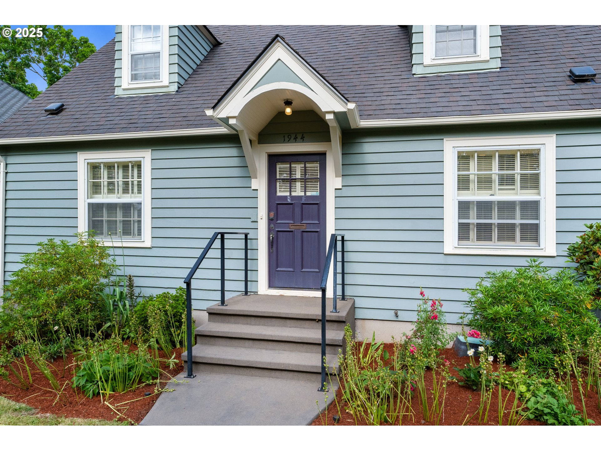 1944 Alder Street Eugene, OR 97405 - Photo 3 of 46 a front view of a house with a yard