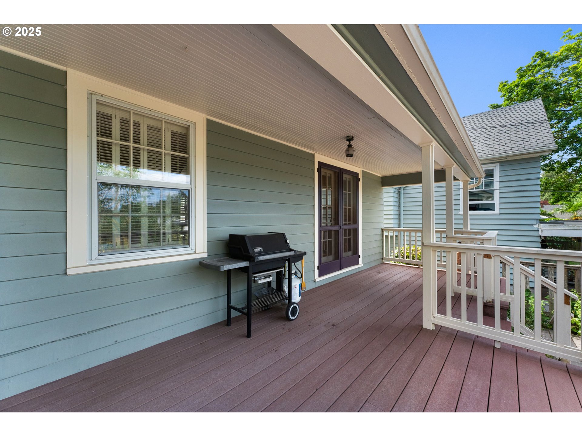 1944 Alder Street Eugene, OR 97405 - Photo 34 of 46 a view of backyard with a deck and wooden floor