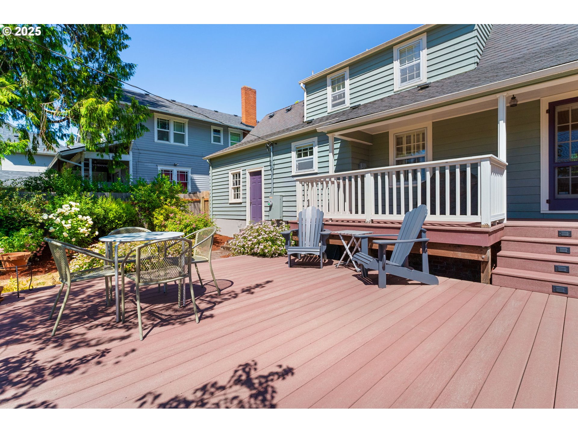 1944 Alder Street Eugene, OR 97405 - Photo 36 of 46 a view of a house with patio and wooden deck