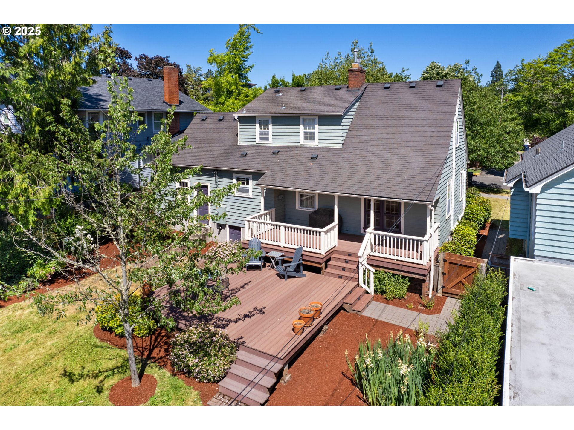 1944 Alder Street Eugene, OR 97405 - Photo 38 of 46 an aerial view of a house with a yard
