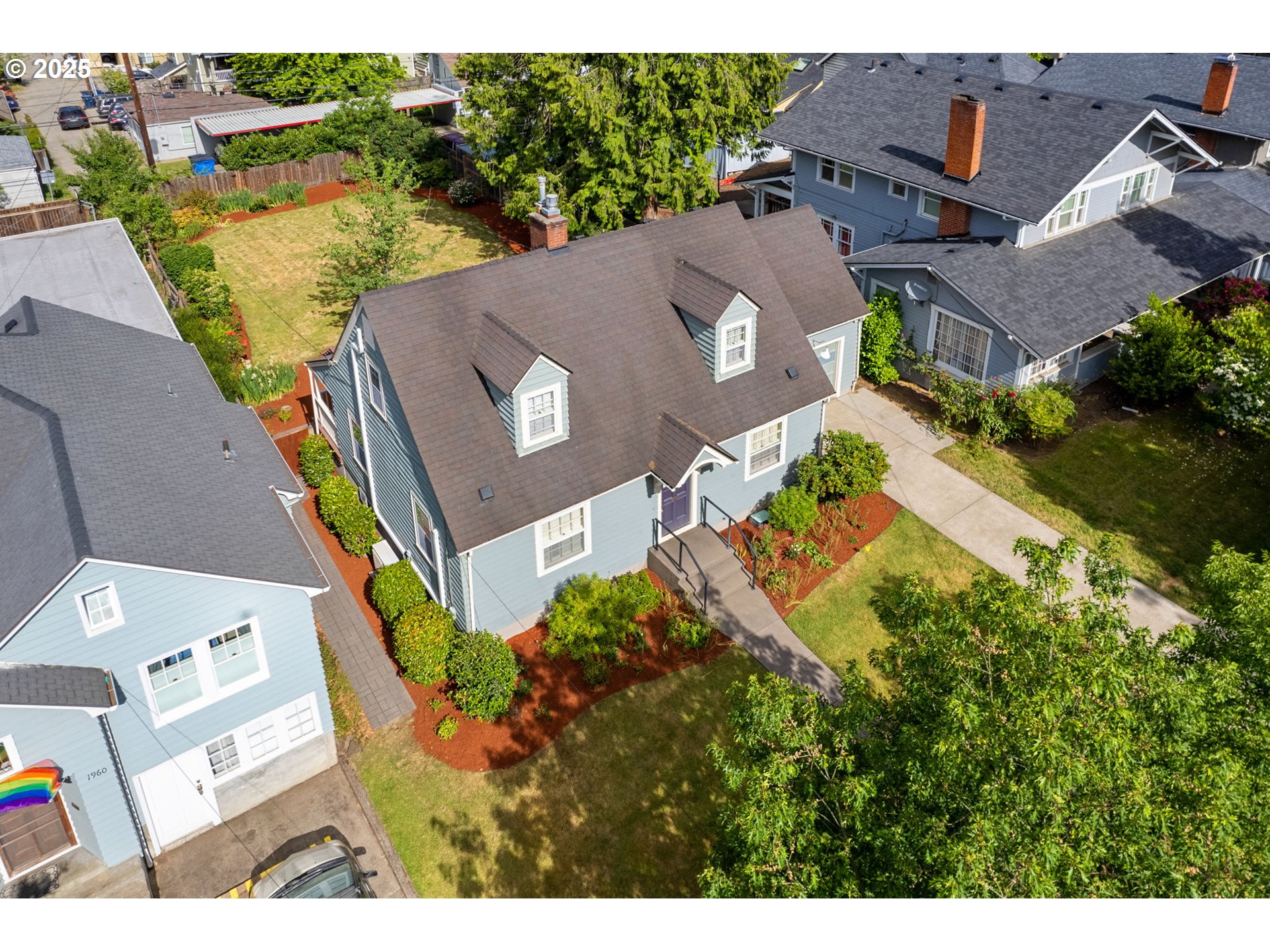 1944 Alder Street Eugene, OR 97405 - Photo 42 of 46 an aerial view of a house with a yard