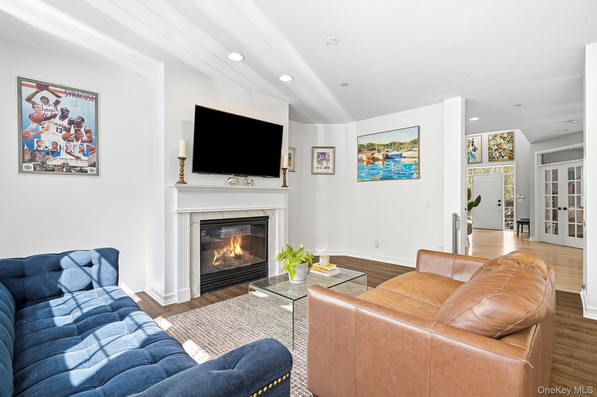 2 Legendary Circle Rye Brook, NY 10573 - Photo 9 of 32 Family room with fireplace