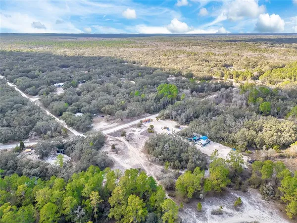 a view of a yard with an ocean