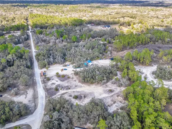 a view of a yard with an ocean beach