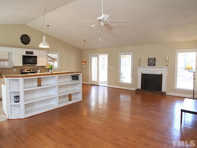 5425 Old Towne Road Raleigh, NC 27612 - Photo 13 of 13 FANTASTIC OPEN FLOOR PLAN CONECEPT THAT STILL MAINTAINS AN ELEMENT OF COZY WITH A FIREPLACE AND BUILT INS.