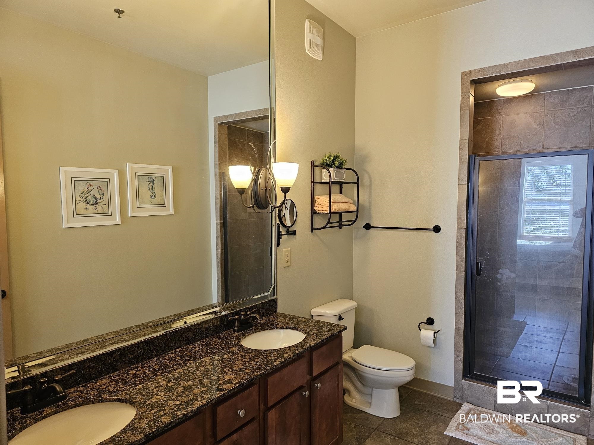 1430 Regency Road, Unit B304 Gulf Shores, AL 36542 - Photo 17 of 33 Primary Ensuite