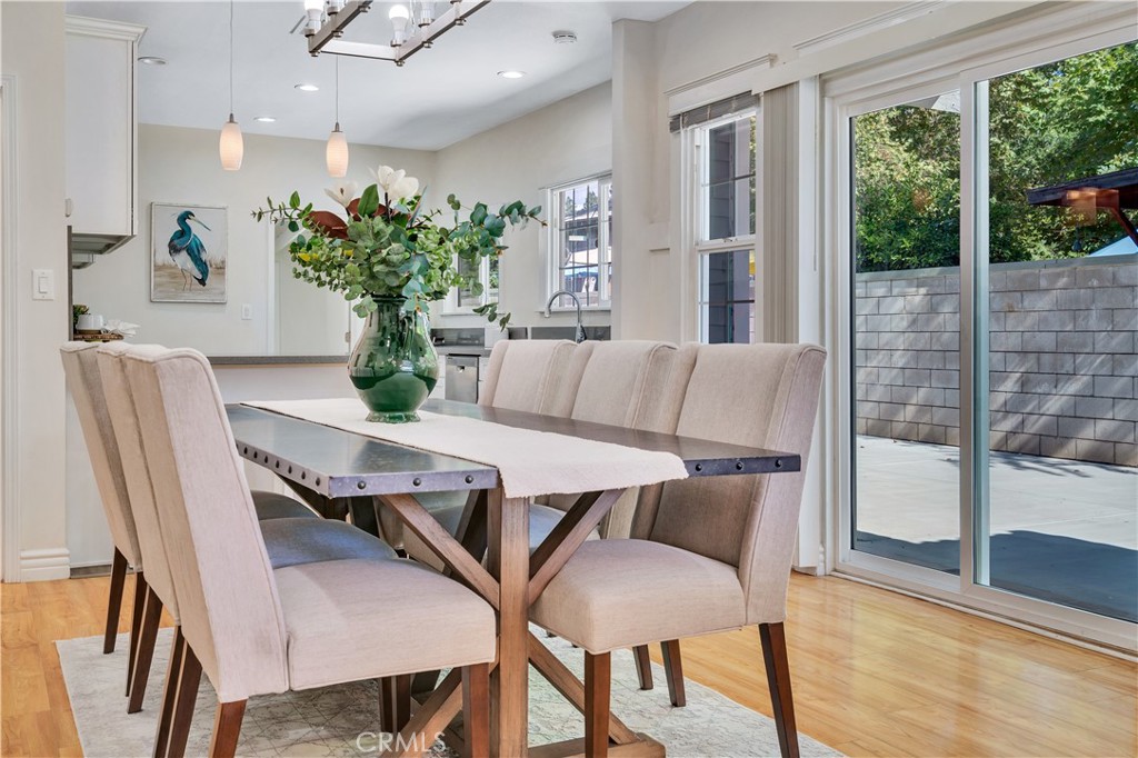 511-unit 1 Alvarado Street Redlands, CA 92373 - Photo 11 of 56 a dining room with furniture and wooden floor