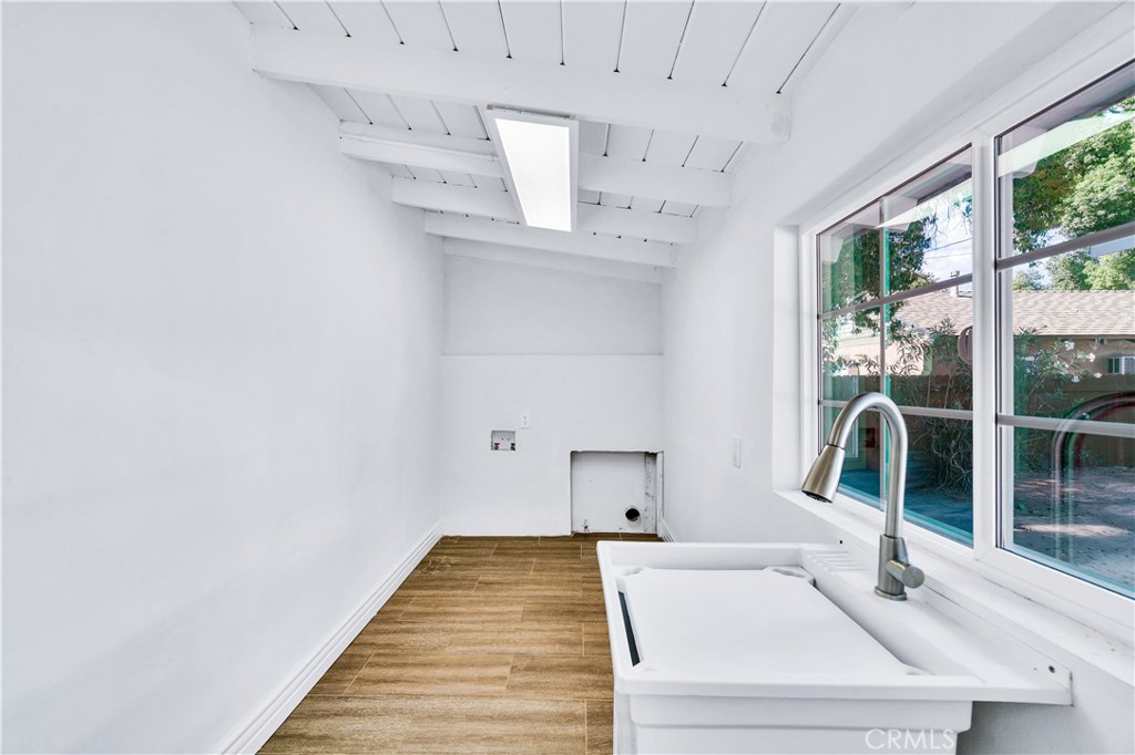 511-unit 1 Alvarado Street Redlands, CA 92373 - Photo 31 of 56 a bathroom with a sink and a mirror