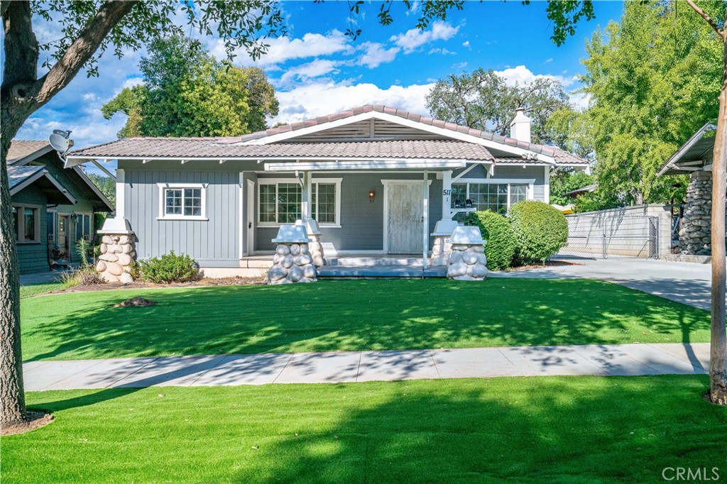 511-unit 1 Alvarado Street Redlands, CA 92373 - Photo 39 of 56 a front view of a house with a yard table and chairs
