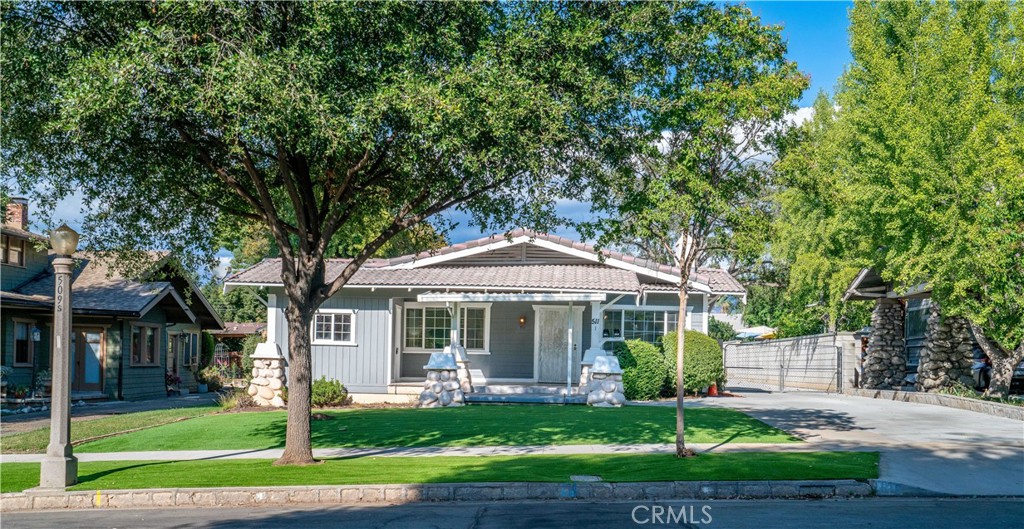 511-unit 1 Alvarado Street Redlands, CA 92373 - Photo 43 of 56 a front view of a house with garden and porch