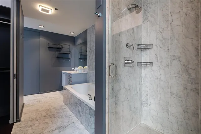 a bathroom with a sink and shower
