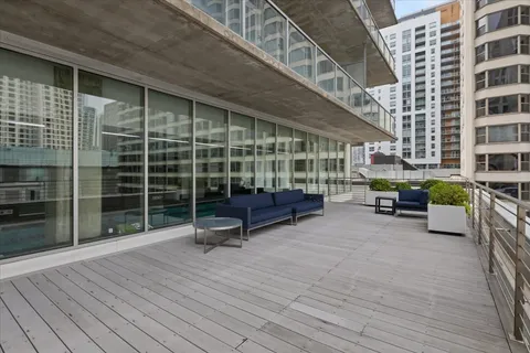 a view of swimming pool with outdoor seating