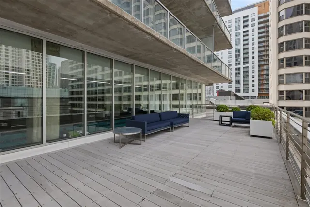 a view of swimming pool with outdoor seating