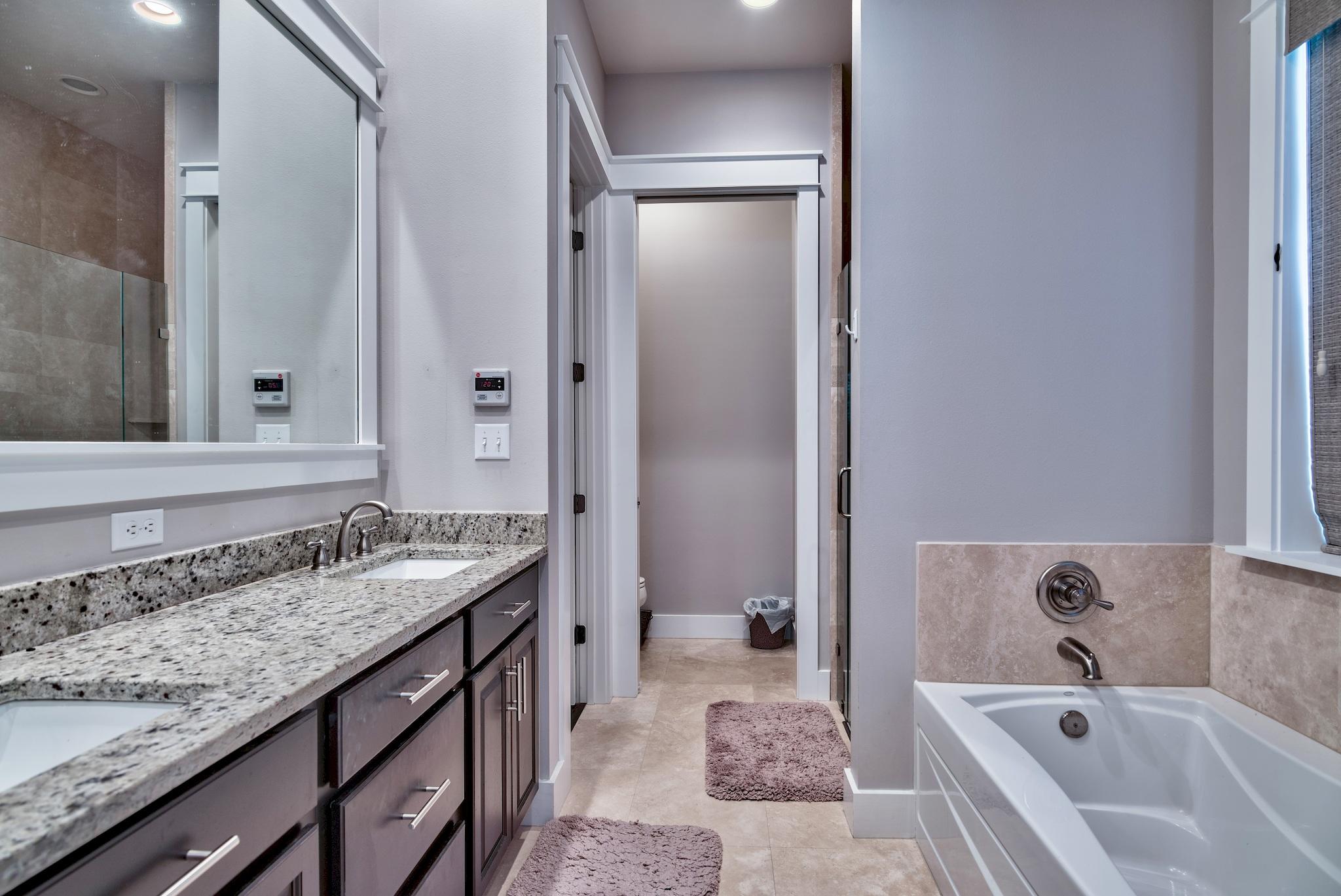 254 Jack Knife Drive Inlet Beach, FL 32461 - Photo 14 of 28 a bathroom with a tub sink and mirror