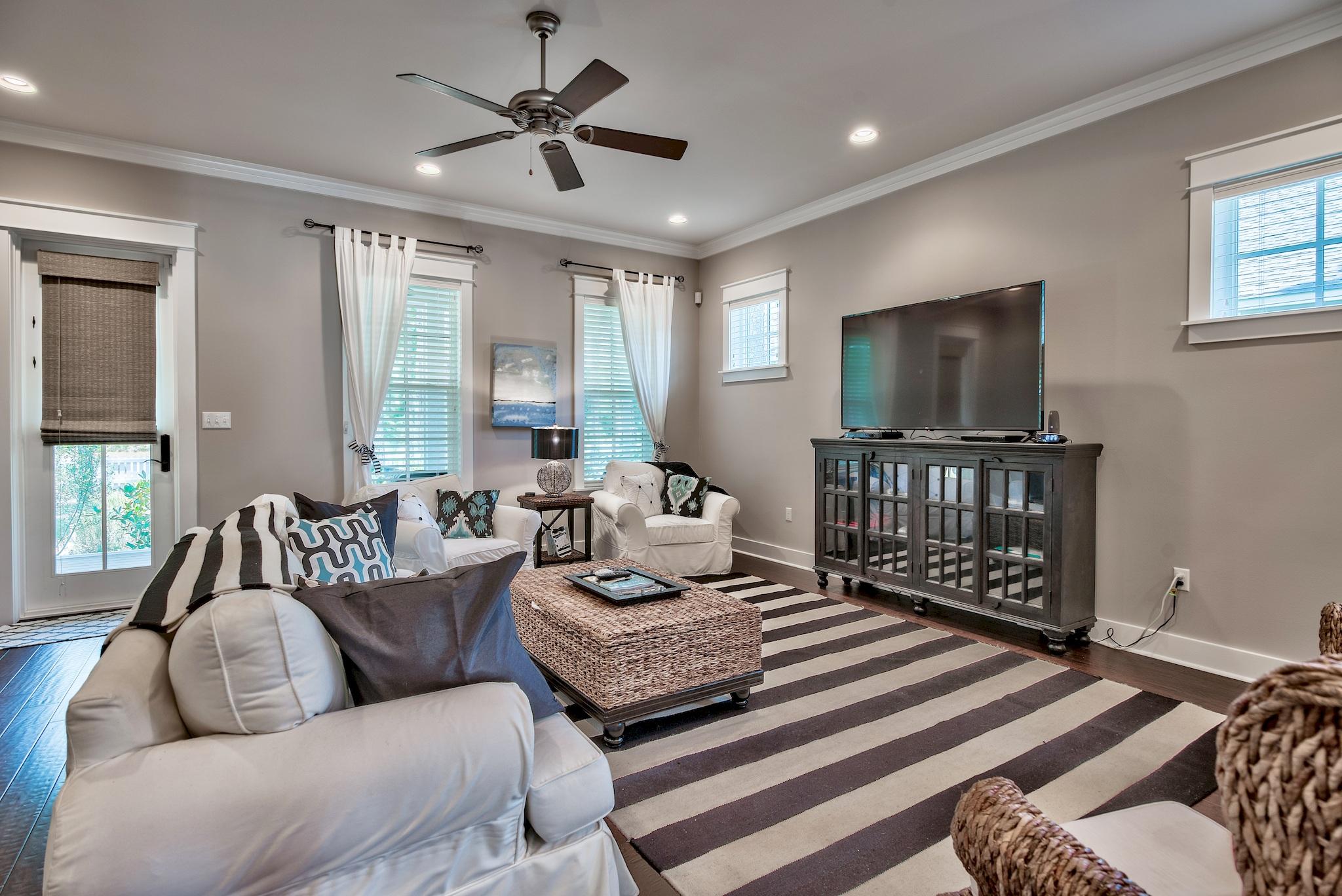 254 Jack Knife Drive Inlet Beach, FL 32461 - Photo 3 of 28 a living room with furniture and a flat screen tv