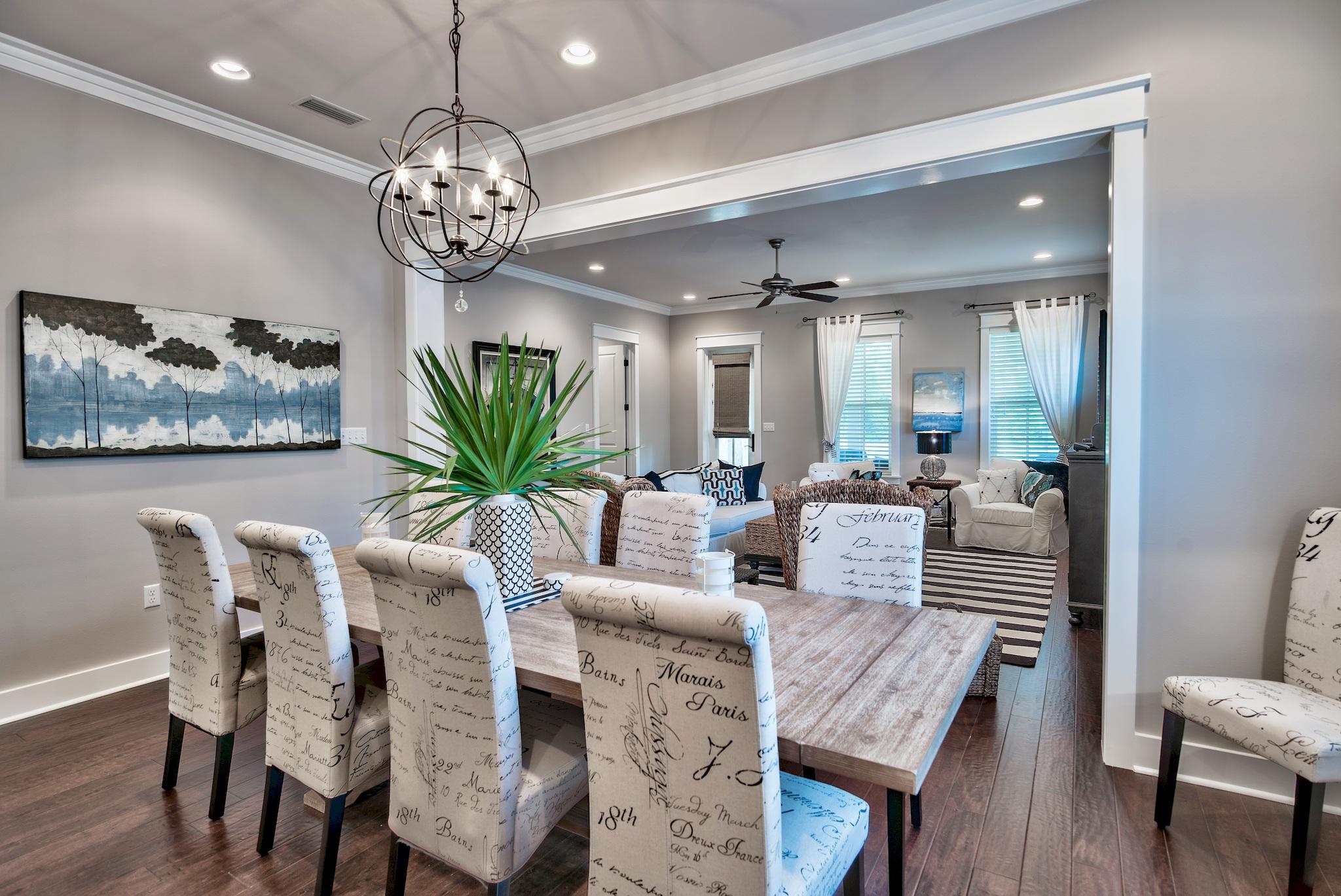 254 Jack Knife Drive Inlet Beach, FL 32461 - Photo 7 of 28 a view of a dining room with furniture and wooden floor