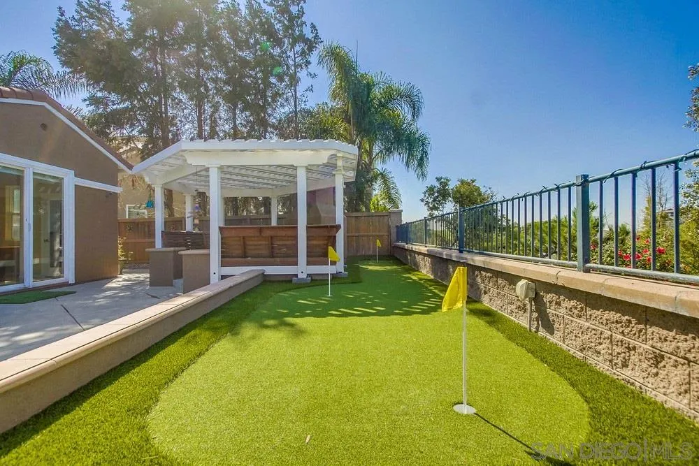 1480 Edgehill Drive Chula Vista, CA 91913 - Photo 24 of 28 a view of a house with swimming pool and porch with furniture