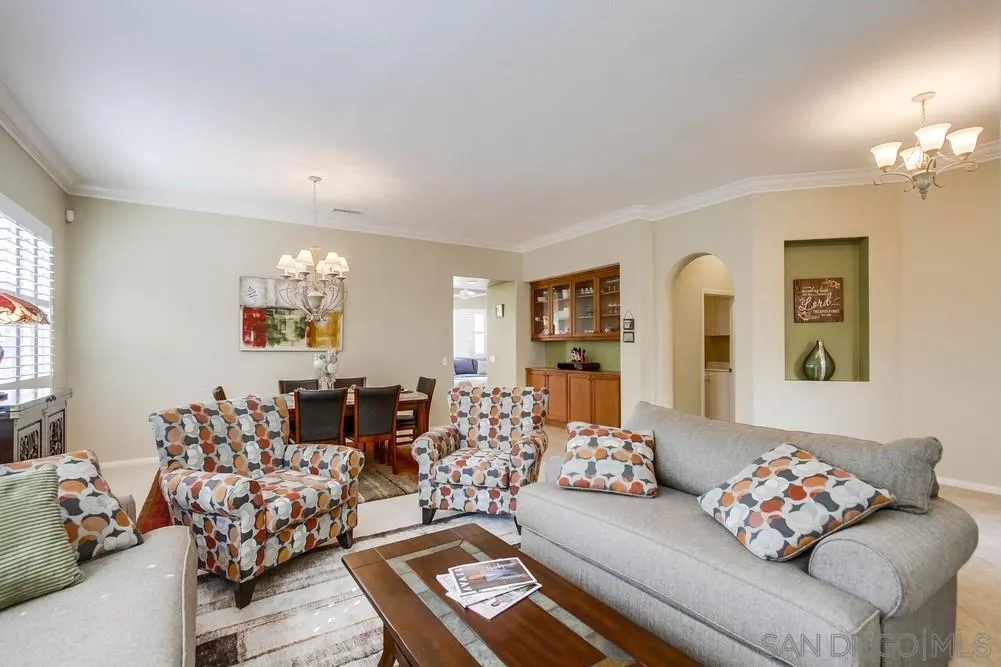 1480 Edgehill Drive Chula Vista, CA 91913 - Photo 7 of 28 a living room with furniture and a chandelier