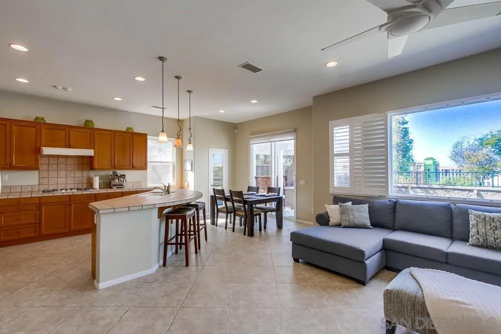 1480 Edgehill Drive Chula Vista, CA 91913 - Photo 8 of 28 a living room with stainless steel appliances kitchen island granite countertop furniture and a large window