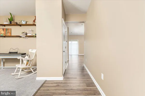 a view of a hallway with workspace