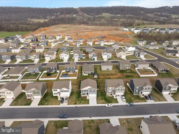 an aerial view of residential building with parking space