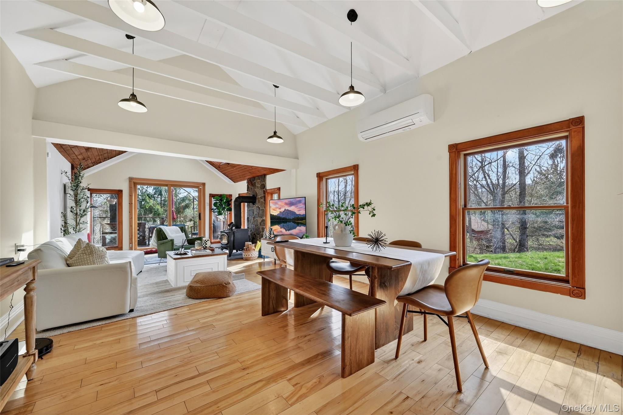 96 Lower Wisner Road Warwick, NY 10990 - Photo 10 of 34 Vaulted ceilings with exposed white beams and pendant lighting