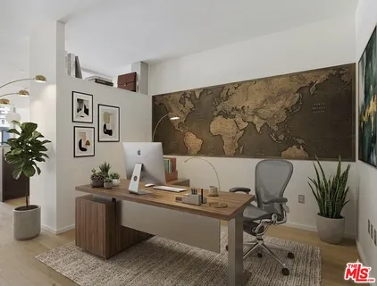a living room with furniture and flowers
