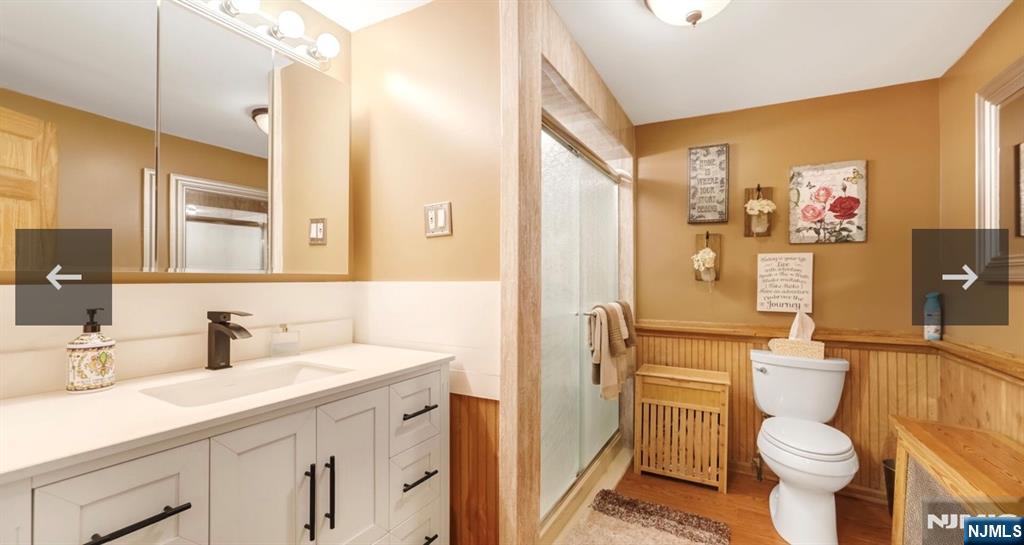 79 North 5th Street Park Ridge, NJ 07656 - Photo 5 of 11 a bathroom with a sink toilet and shower