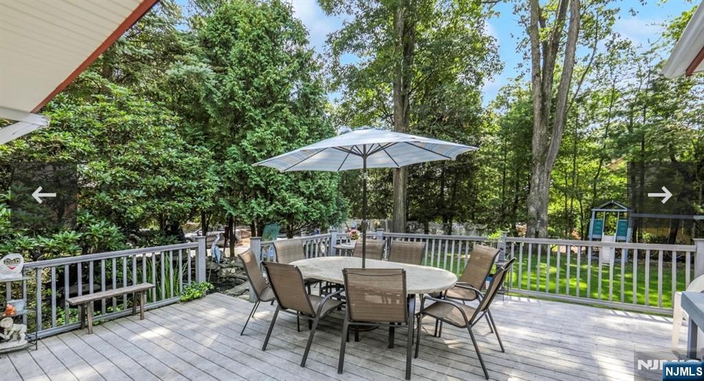 79 North 5th Street Park Ridge, NJ 07656 - Photo 8 of 11 a view of a deck with furniture and a backyard