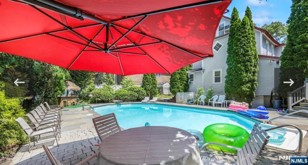 79 North 5th Street Park Ridge, NJ 07656 - Photo 10 of 11 a view of swimming pool with outdoor seating