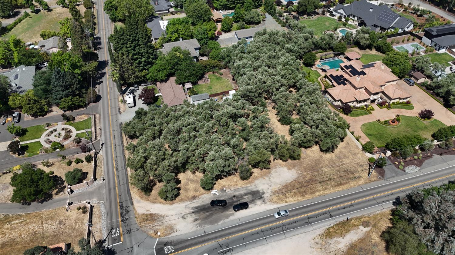 an aerial view of house with yard