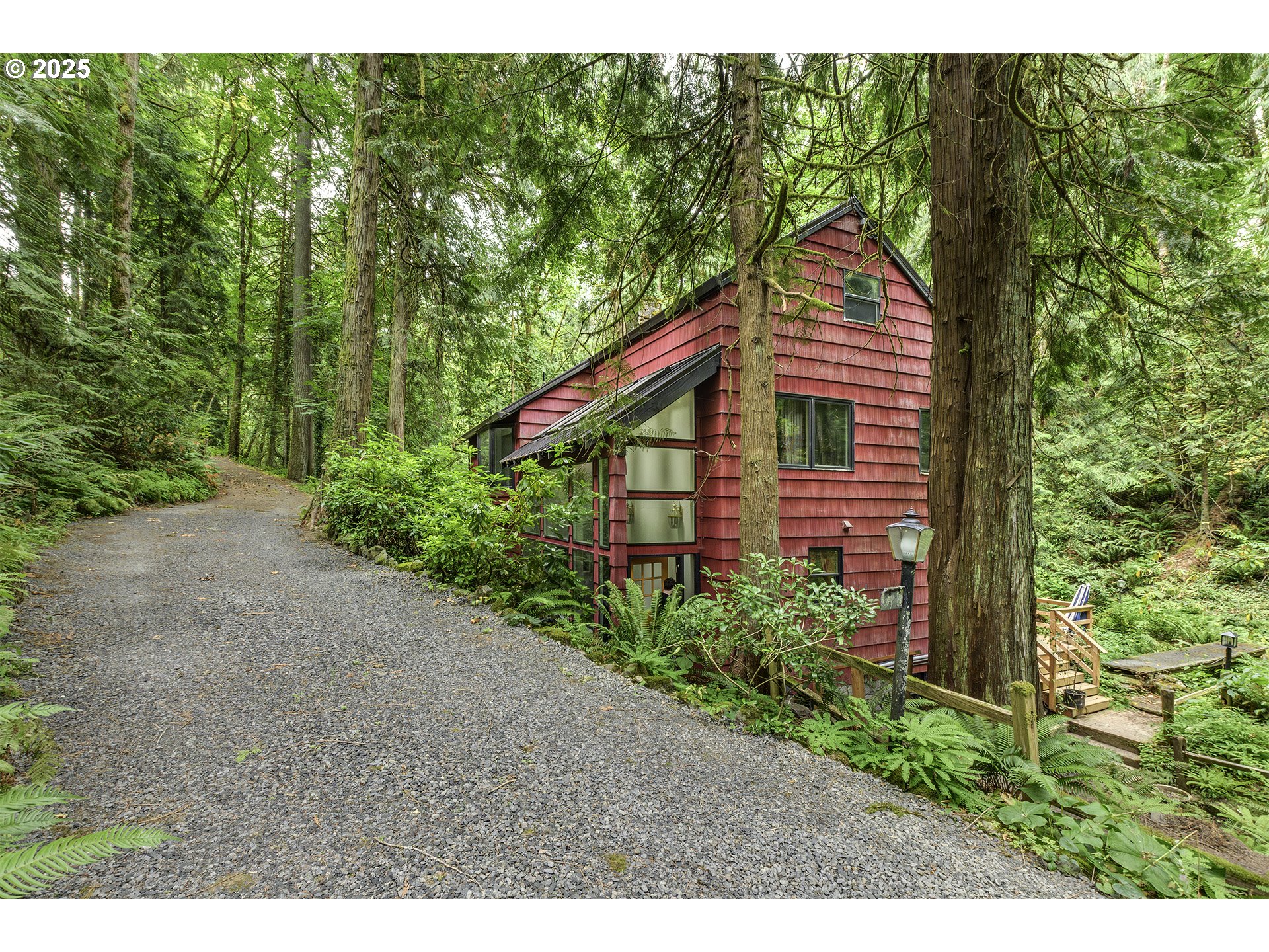 a backyard of a house with lots of green space