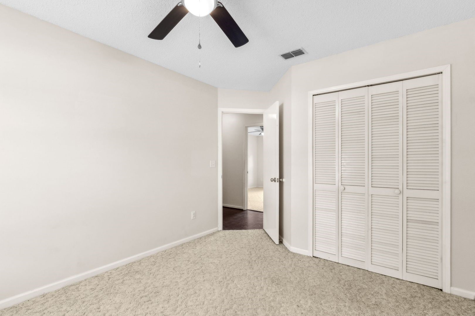 2102 Inverness Road Fernandina Beach, FL 32034 - Photo 19 of 29 an empty room with staircase