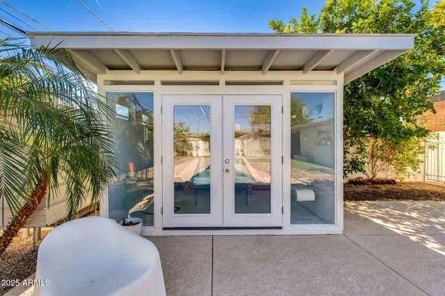 a view of an entryway and livingroom