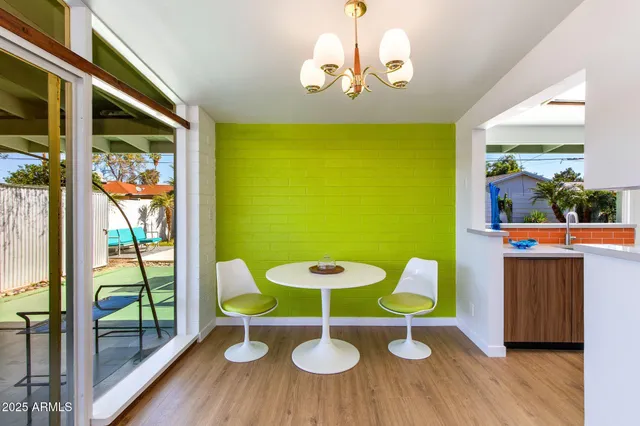 a kitchen with stainless steel appliances granite countertop a sink and stove top oven