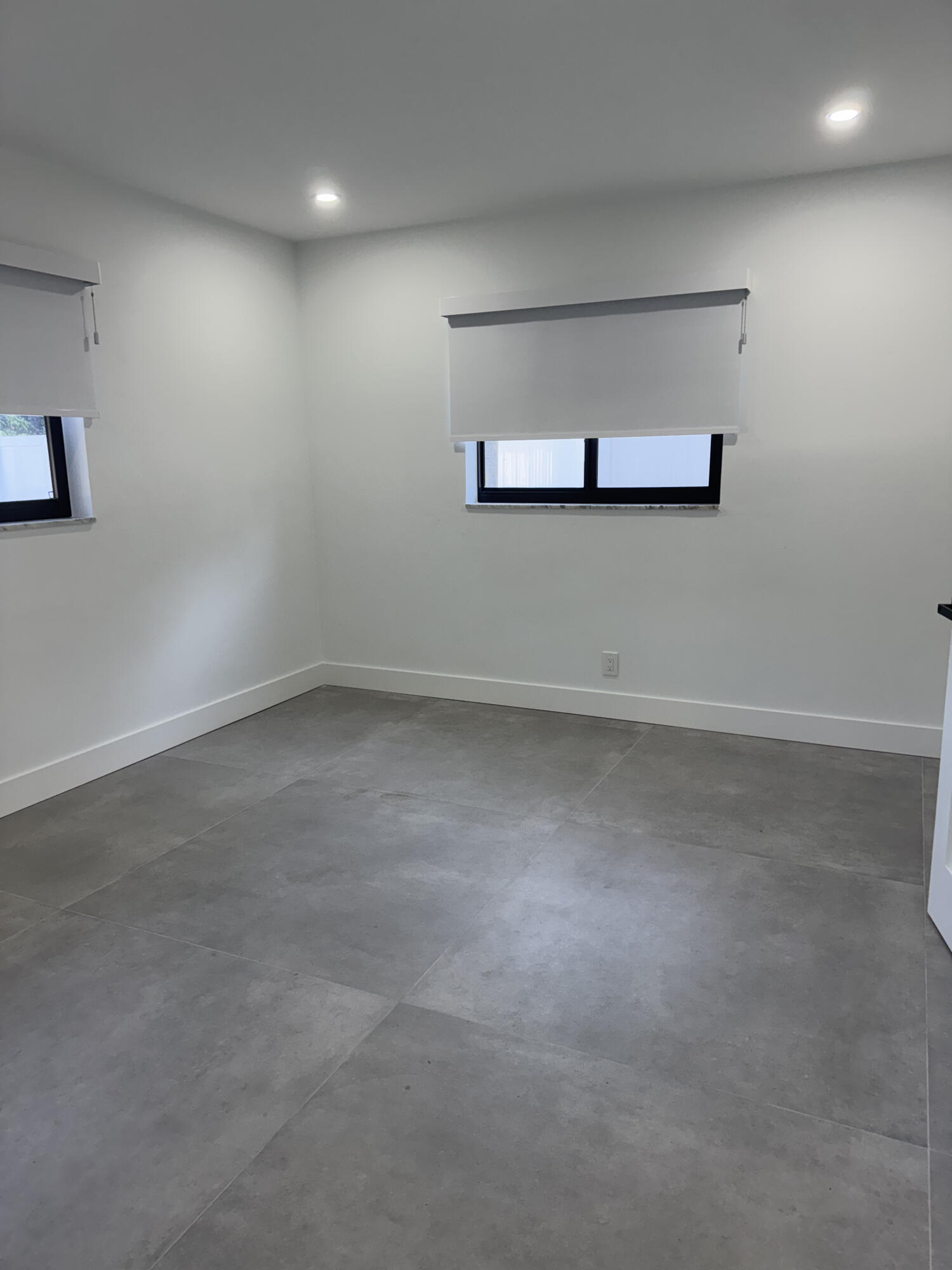 1191 Southwest 15th Street Boca Raton, FL 33486 - Photo 3 of 6 an empty room with a empty space and window