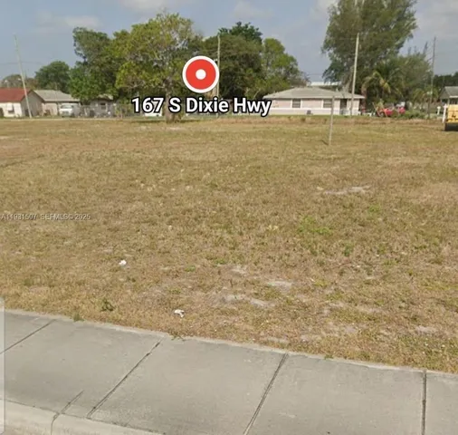 a view of a lake with a big yard