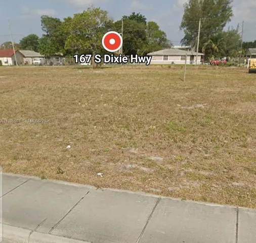 a view of a lake with a big yard