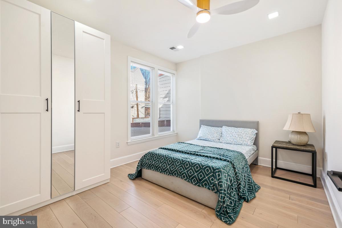 4420 15th Street Northwest Washington, DC 20011 - Photo 14 of 30 a bedroom with a bed and a window