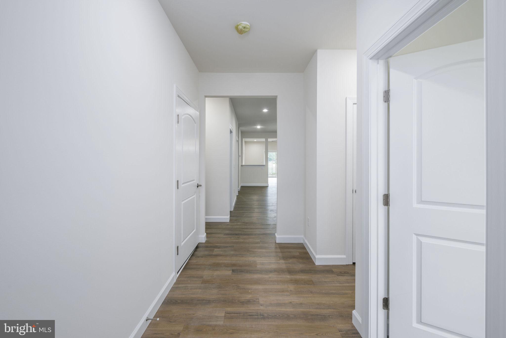 5 Valhalla Court Dover, DE 19904 - Photo 11 of 53 a view of a hallway with wooden floor