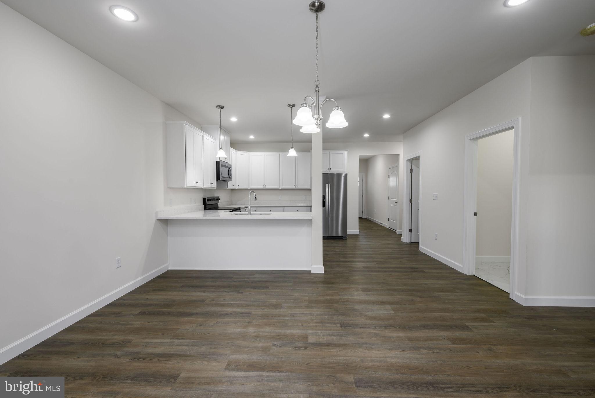 5 Valhalla Court Dover, DE 19904 - Photo 22 of 53 a view of kitchen with refrigerator and window