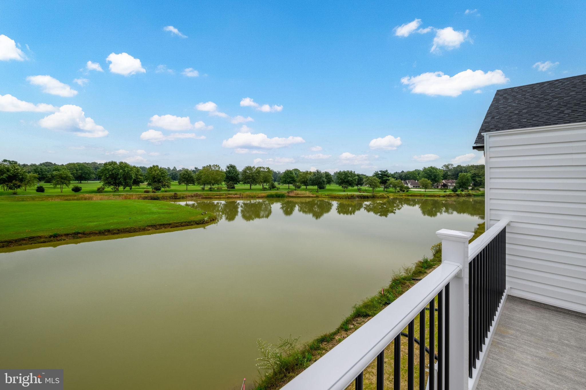 5 Valhalla Court Dover, DE 19904 - Photo 42 of 53 a view of a lake with a big yard