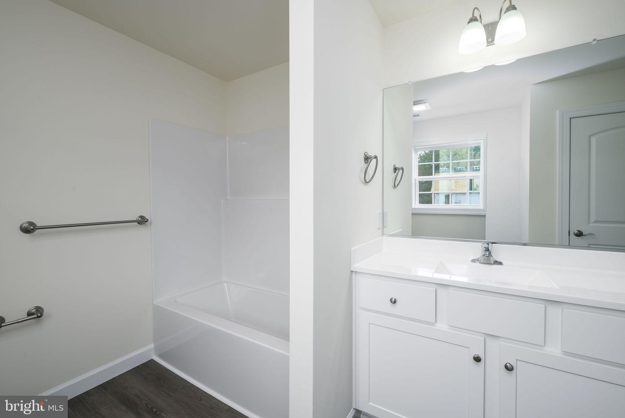 5 Valhalla Court Dover, DE 19904 - Photo 49 of 53 a bathroom with a sink and a bathtub