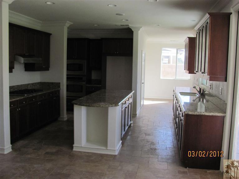 83329 Stagecoach Road Indio, CA 92203 - Photo 4 of 10 a kitchen with granite countertop a sink and cabinets